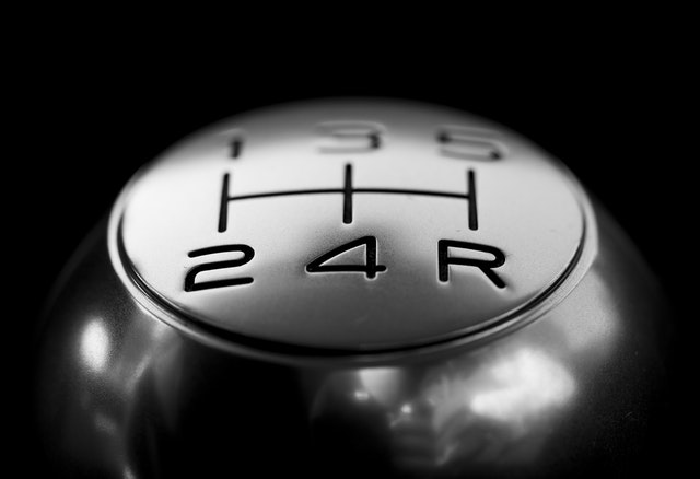 close-up-of-gear-shift-over-black-background